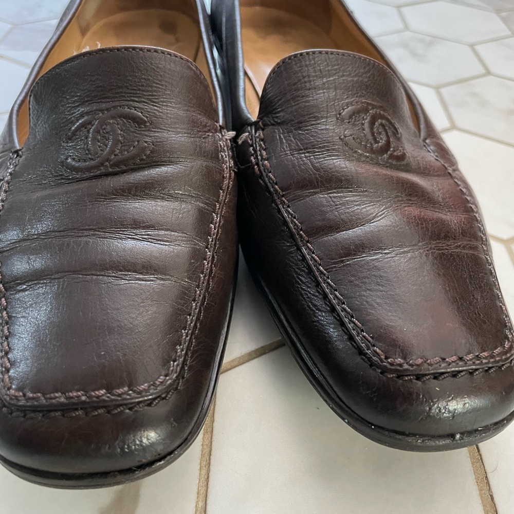 Chanel brown loafers.